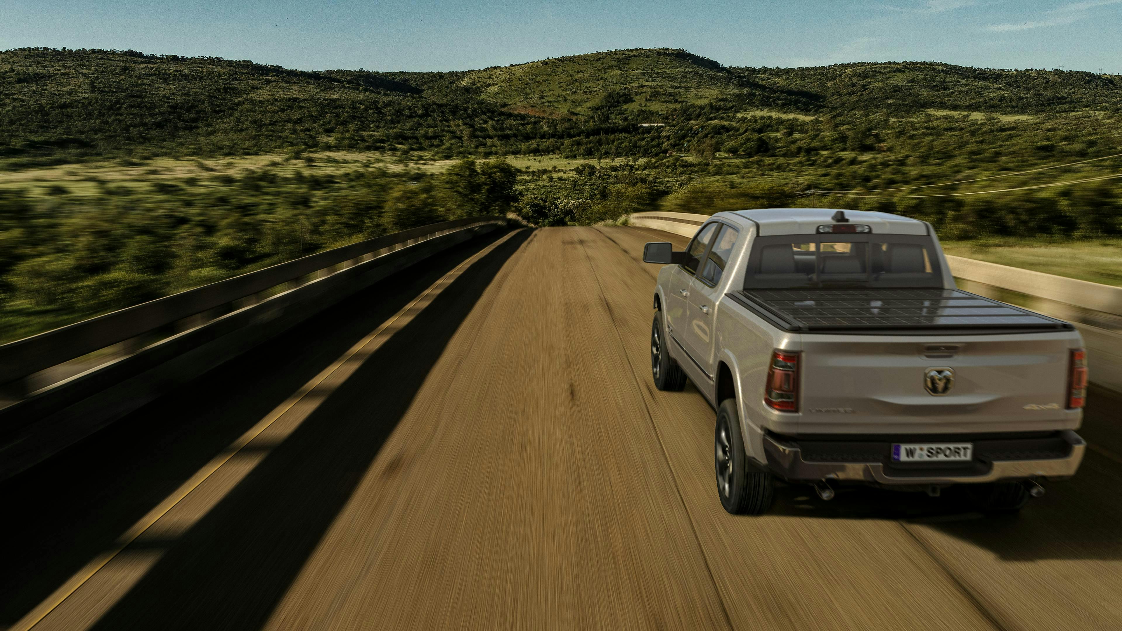 Pilot SOLIS solar tonneau cover featured on a Ram pickup truck.