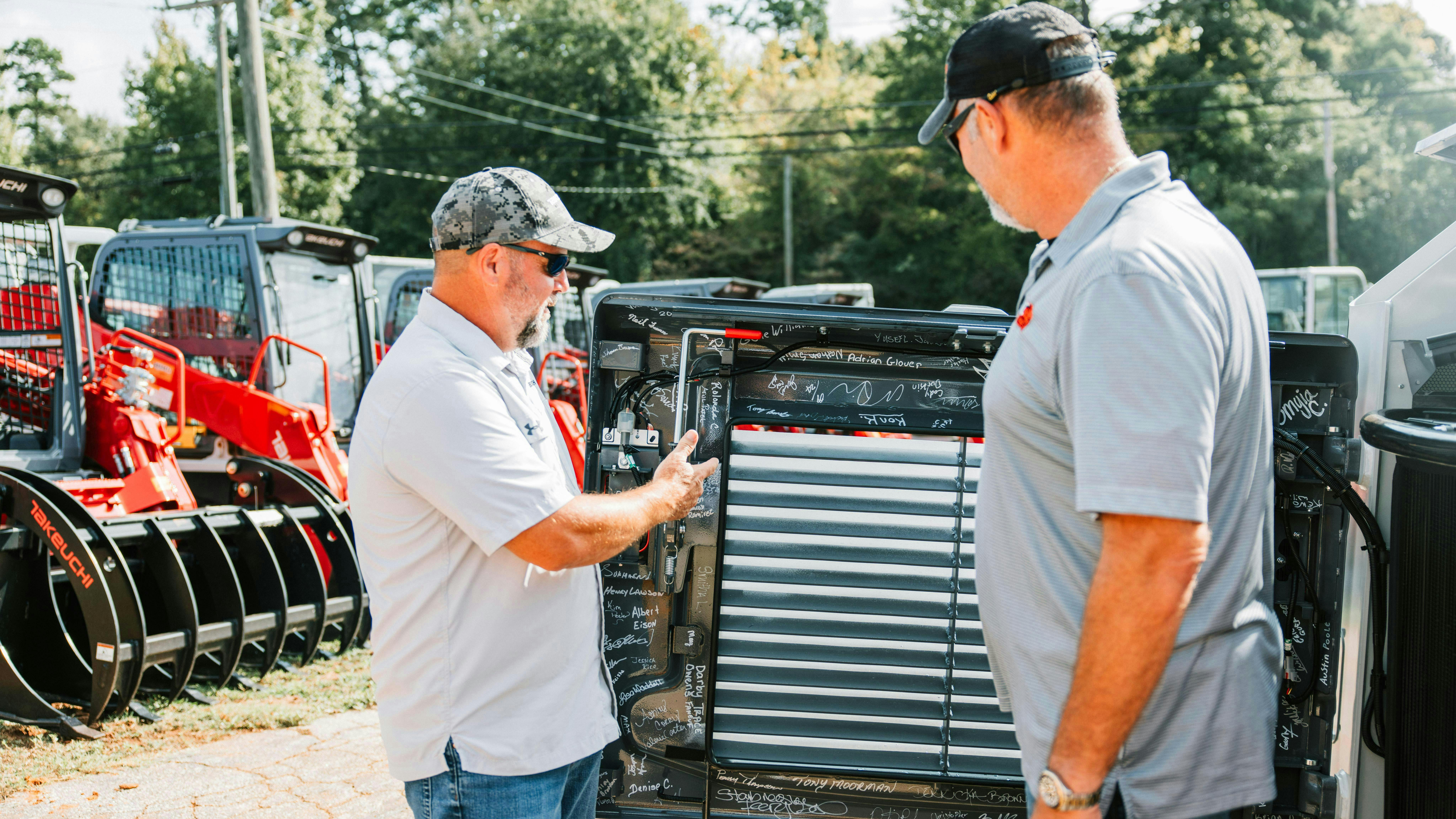 Walk around inspection of the 10,000th machine signed by all of the Moore, South Carolina, facility employees.