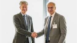 Oliver Weiss of Liebherr Mining, left, and Renato Bruno of Bruno Generators Group sign the agreement. Oliver Weiss of Liebherr Mining, left, and Renato Bruno of Bruno Generators Group sign the agreement.
