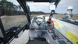 The low-profile boom and mirrors on the operator’s left and right provide visibility on the TL623 telehandler. The low-profile boom and mirrors on the operator’s left and right provide visibility on the TL623 telehandler.
