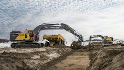 The EC230 battery-electric excavator working on site. The EC230 battery-electric excavator working on site.