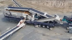 The oversized cone feed hopper has an overflow chute. The oversized cone feed hopper has an overflow chute.