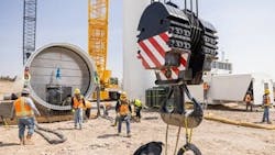 Wind farm construction requires extremely large cranes that are often owned rather than rented. Wind farm construction requires extremely large cranes that are often owned rather than rented.