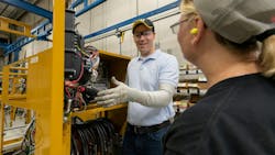 Caterpillar representative demonstrates safety techniques as part of the new program. Caterpillar representative demonstrates safety techniques as part of the new program.