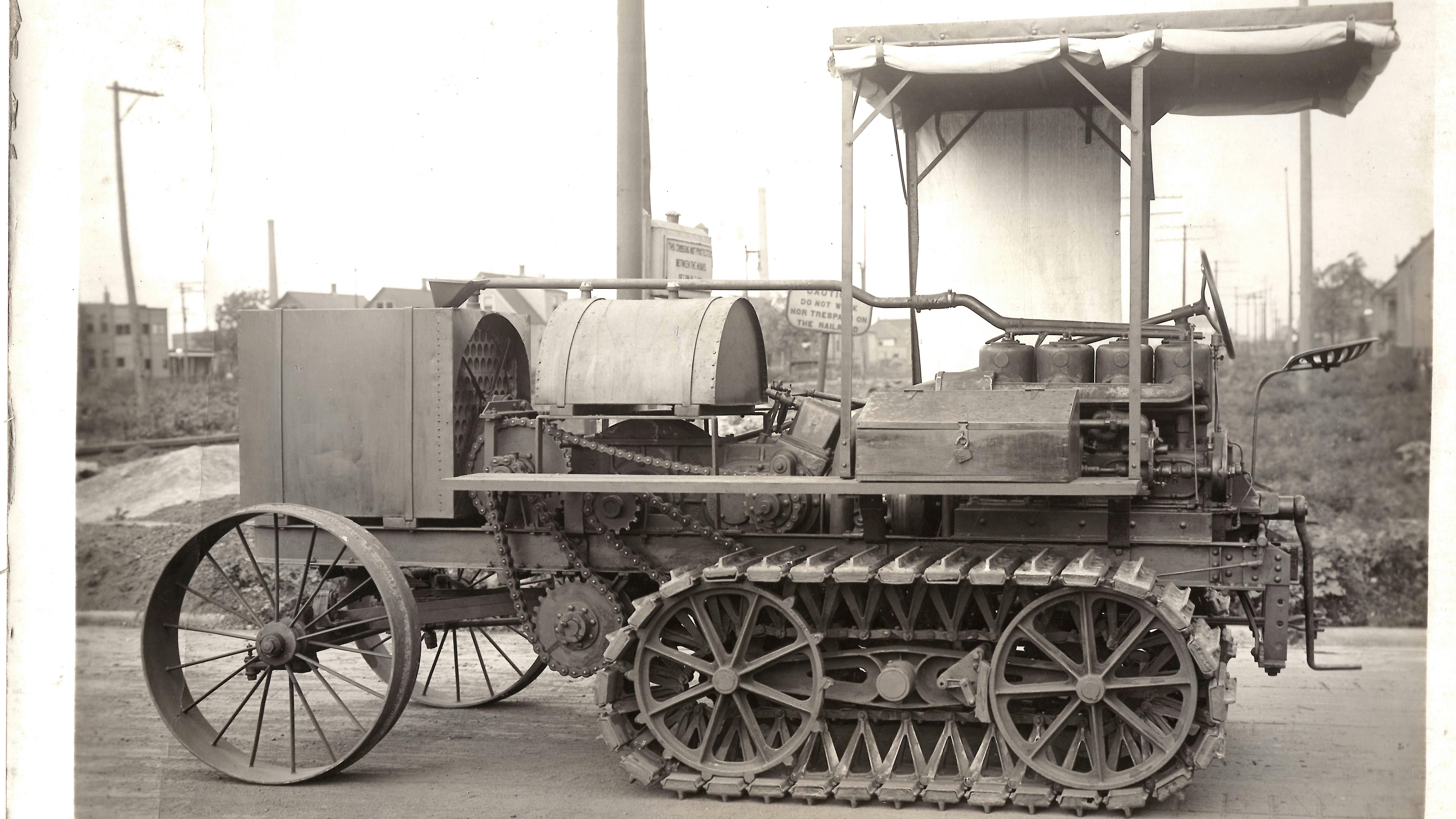 Athey tractor with tarps