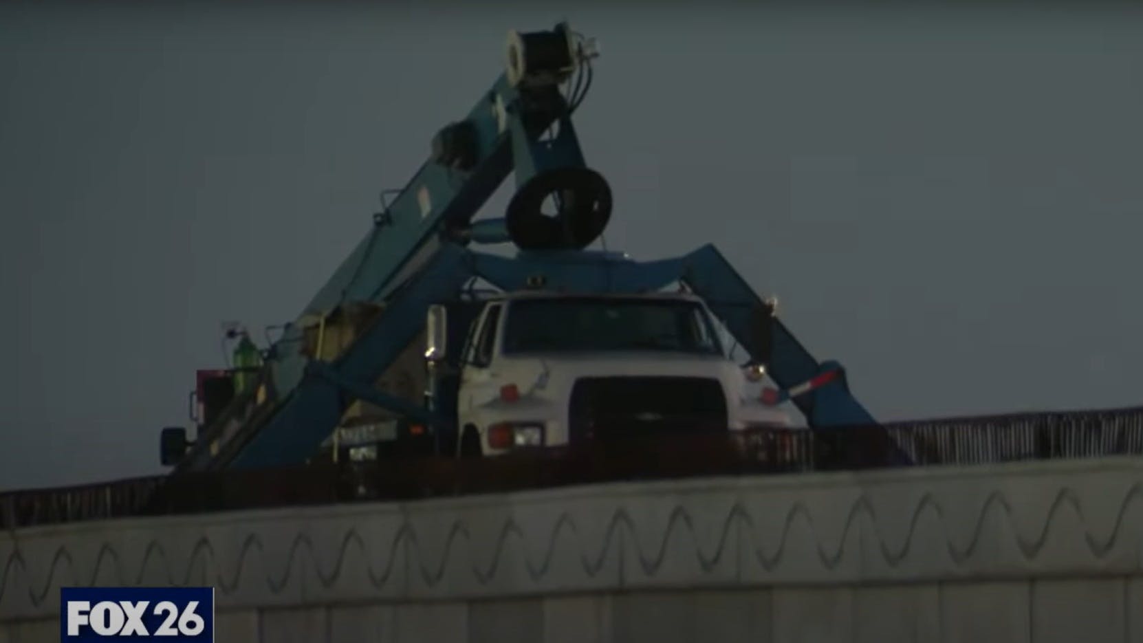 Worker dies in boom truck collapse