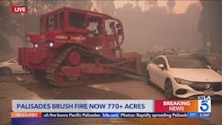 Palisades Fire: Bulldozer moves cars blocking road Palisades Fire: Bulldozer moves cars blocking road