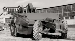 The unique scraper wheel steering is demonstrated by what is believed to be a 1MDT-6SH. Rated at 10 yards, it was powered by an International Harvester TDRM diesel.