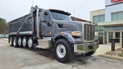 Gray truck on a gray day, but a bright driving experience: 2021 Model 567 dump is ready to roll at Ohio Peterbilt. It has very low miles, the right specs for northeastern Ohio, and looks and performs like new. That makes it a compelling argument for buying “used.” Gray truck on a gray day, but a bright driving experience: 2021 Model 567 dump is ready to roll at Ohio Peterbilt. It has very low miles, the right specs for northeastern Ohio, and looks and performs like new. That makes it a compelling argument for buying “used.”