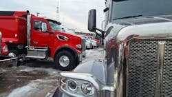 Asking price for the pre-owned, low-mileage Peterbilt 567 (foreground), our test truck, is about 29% less than the new red dumper (at left), but it has similar componentry and will do the same job. The original warranty has expired, but used-truck coverage is available. Historically, used truck sales account for 60% to 70% of the total Class 8 vocational market. Asking price for the pre-owned, low-mileage Peterbilt 567 (foreground), our test truck, is about 29% less than the new red dumper (at left), but it has similar componentry and will do the same job. The original warranty has expired, but used-truck coverage is available. Historically, used truck sales account for 60% to 70% of the total Class 8 vocational market.
