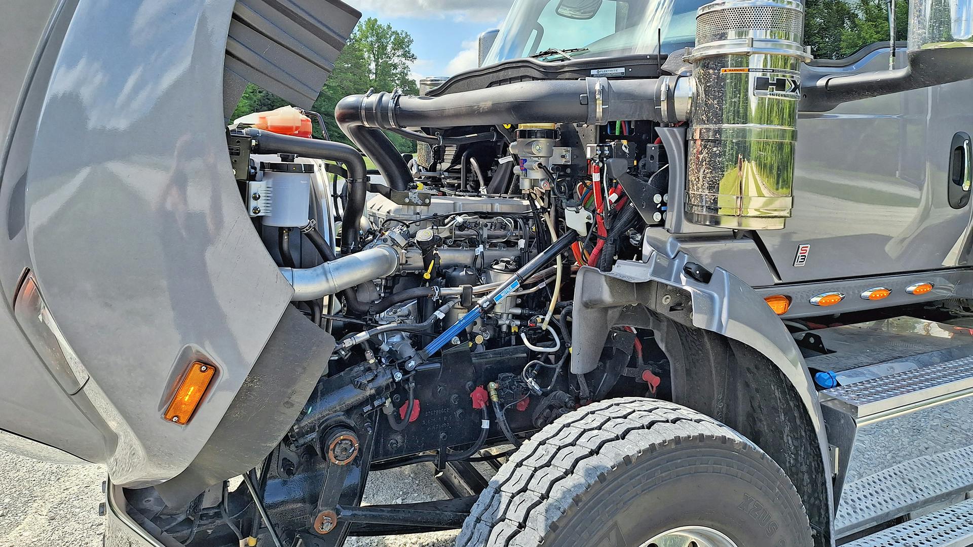 The International S13 diesel has a clean, uncluttered look. Six vocational ratings, from 370 to 515 horsepower, are offered. The engine and T14 automated transmission weigh 3,197 pounds.