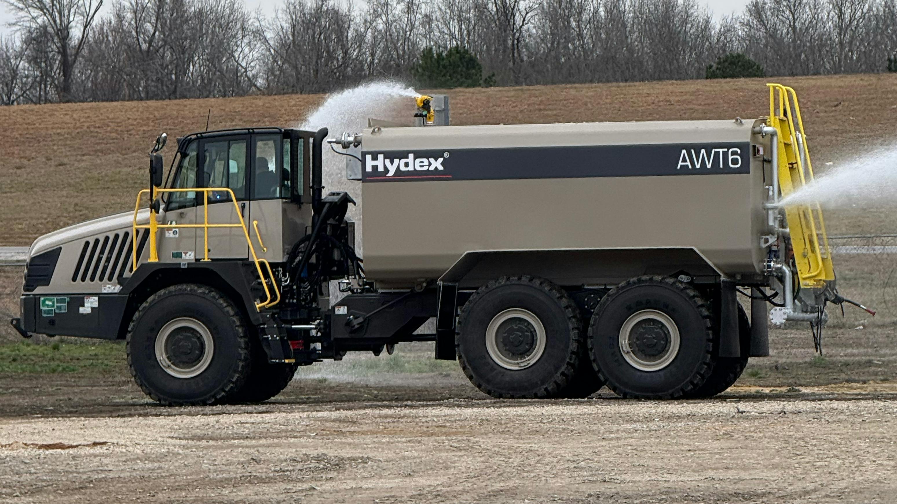A front bumper sprayer, vertical side sprayer, and rear spray bar provide more than 82 feet of coverage.
