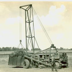 The Front End Caster Crane reversed the usual design in that the tractor pushed the crane. The rubber tires were on free-revolving bogies, and the cable control unit remained on the back of the tractor. The Front End Caster Crane reversed the usual design in that the tractor pushed the crane. The rubber tires were on free-revolving bogies, and the cable control unit remained on the back of the tractor.