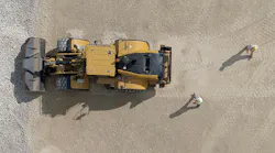 The optional warning system uses radar and vision sensors to detect hazard potential, alert operators, and inhibit motion when initiating reverse motion.