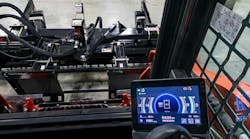 Information from the attachment is displayed in the cab. The 2x2-inch tag is affixed to the attachment (upper part of photo). Information from the attachment is displayed in the cab. The 2x2-inch tag is affixed to the attachment (upper part of photo).