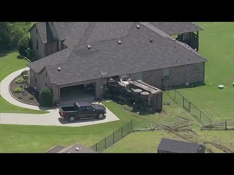 Driver injured after dump truck crashes into North Texas house, officials say