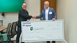 Dr. Robert Keynton, (left) dean of William States Lee College of Engineering at UNC Charlotte, and Mike Ballweber, president of Doosan Bobcat North America Dr. Robert Keynton, (left) dean of William States Lee College of Engineering at UNC Charlotte, and Mike Ballweber, president of Doosan Bobcat North America