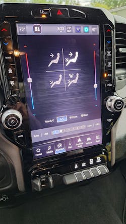 Large display screen displays HVAC controls after the Comfort button is touched, but the virtual buttons are locked out at highway speeds. Thankfully, redundant HVAC buttons on either side of the screen still work. Large display screen displays HVAC controls after the Comfort button is touched, but the virtual buttons are locked out at highway speeds. Thankfully, redundant HVAC buttons on either side of the screen still work.