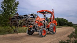 The 63-horsepower M62 is the largest of Kubota’s three tractor loader backhoes. The integrated main frame is reinforced to ensure structural integrity whether the load is on the loader, the backhoe, or the standard 3-point hitch. The standard 4WD is combined with a differential lock. The 63-horsepower M62 is the largest of Kubota’s three tractor loader backhoes. The integrated main frame is reinforced to ensure structural integrity whether the load is on the loader, the backhoe, or the standard 3-point hitch. The standard 4WD is combined with a differential lock.
