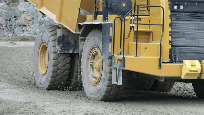 Haul trucks similar to this Caterpillar unit are at work at the RDU airport project.