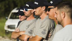 Competitors in the National Equipment League watch one of the operator events. Competitors in the National Equipment League watch one of the operator events.