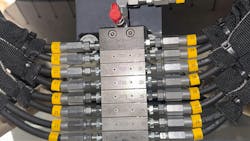 Divider valves are mapped precisely to each of the 63 lube points on the Wirtgen milling machine. Divider valves are mapped precisely to each of the 63 lube points on the Wirtgen milling machine.
