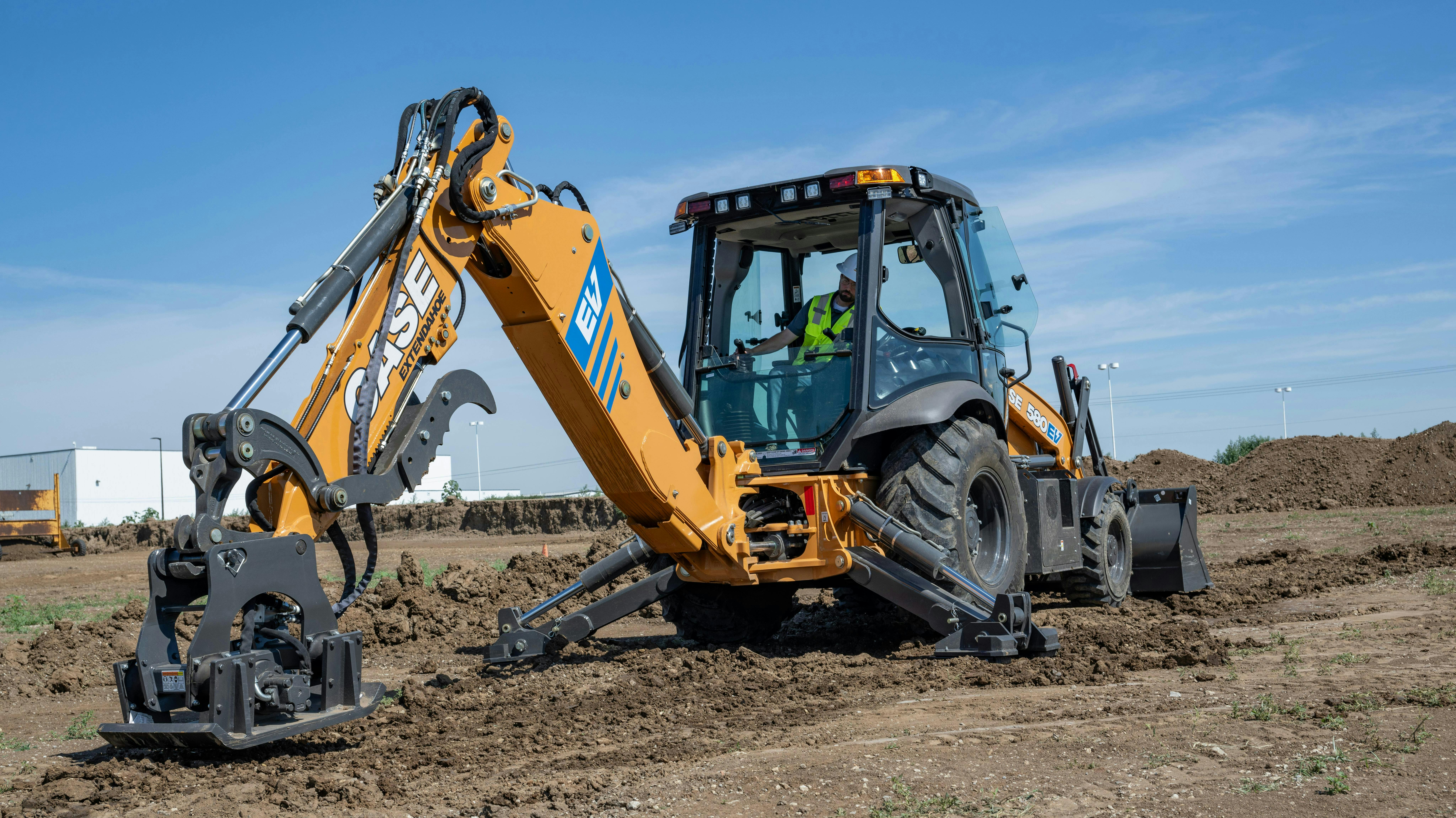 Case 580EV electric backhoe loader.