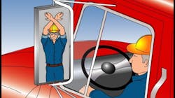 Signaling a truck driver to stop. Signaling a truck driver to stop.