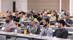 Attendees listen to a Conexpo 2023 education session. Attendees listen to a Conexpo 2023 education session.