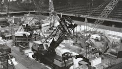 Cranes and excavators occupy part of the International Amphitheater in Chicago during the 1963 Construction Equipment Exposition (from which today’s Conexpo takes its name). Equipment includes machines from Lorain, Bay City, Insley, Marion, Bucyrus-Erie, and Koehring. (Bucyrus-Erie image). Cranes and excavators occupy part of the International Amphitheater in Chicago during the 1963 Construction Equipment Exposition (from which today’s Conexpo takes its name). Equipment includes machines from Lorain, Bay City, Insley, Marion, Bucyrus-Erie, and Koehring. (Bucyrus-Erie image).