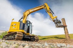 Cat 308 CR Fixed Boom Mini Excavator with tiltrotator grapple holding log Cat 308 CR Fixed Boom Mini Excavator with tiltrotator grapple holding log