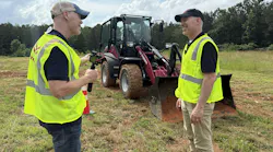 Keith Gribbins talks with a Yanmar Product Manager
