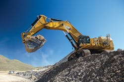 Cat’s 6015 Mining Shovel on a pile of earth Cat’s 6015 Mining Shovel on a pile of earth