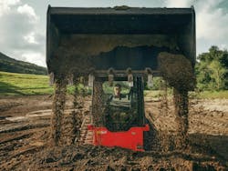 Kioti CTL close dumping dirt Kioti CTL close dumping dirt