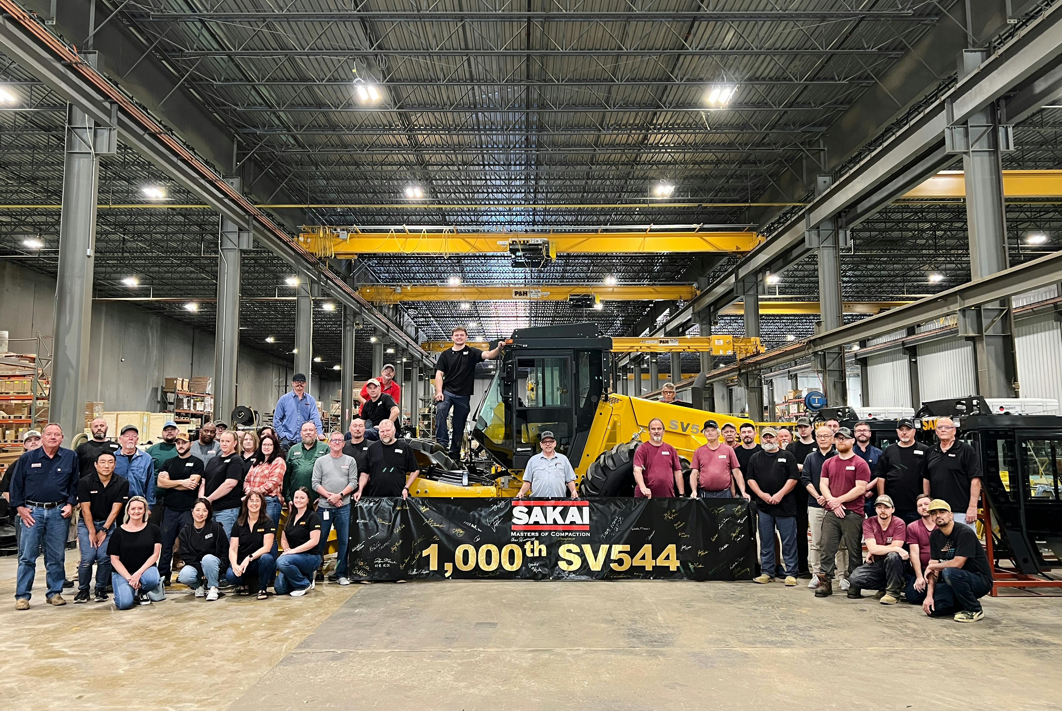 Sakai employees with roller