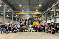 Sakai employees with roller Sakai employees with roller