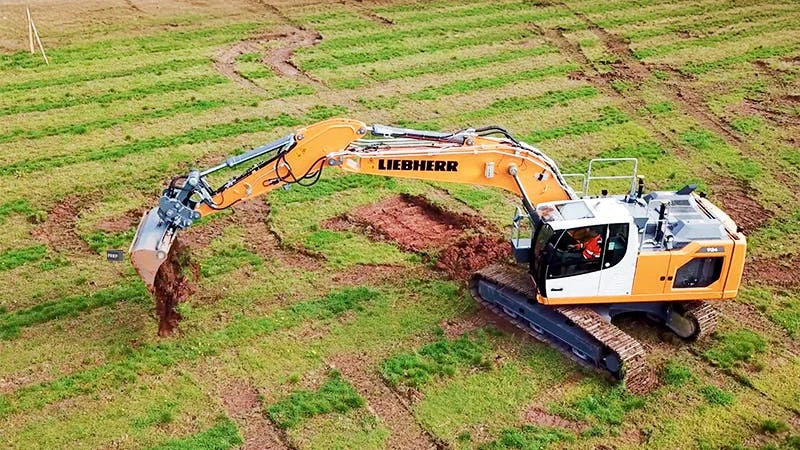 Liebherr excavator in field