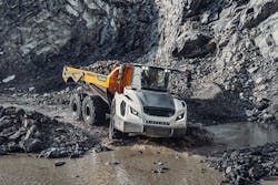 A Liebherr TA230 articulated dump truck hauling ag A Liebherr TA230 articulated dump truck hauling ag