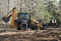 Case Construction Equipment's 580SN King Backhoe with a Case dozer in the background. Case Construction Equipment's 580SN King Backhoe with a Case dozer in the background.