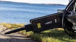 Ignite Attachments Breaker attachments sitting on the grass by a lake. Ignite Attachments Breaker attachments sitting on the grass by a lake.