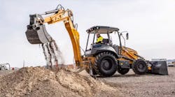 CASE Utility Plus Backhoe Loader digging in a dirt pile. CASE Utility Plus Backhoe Loader digging in a dirt pile.