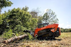 Kubota SVL110 compact track loader grabbing a tree with a grapple attachment. Kubota SVL110 compact track loader grabbing a tree with a grapple attachment.