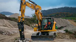 Cat excavator with hammer