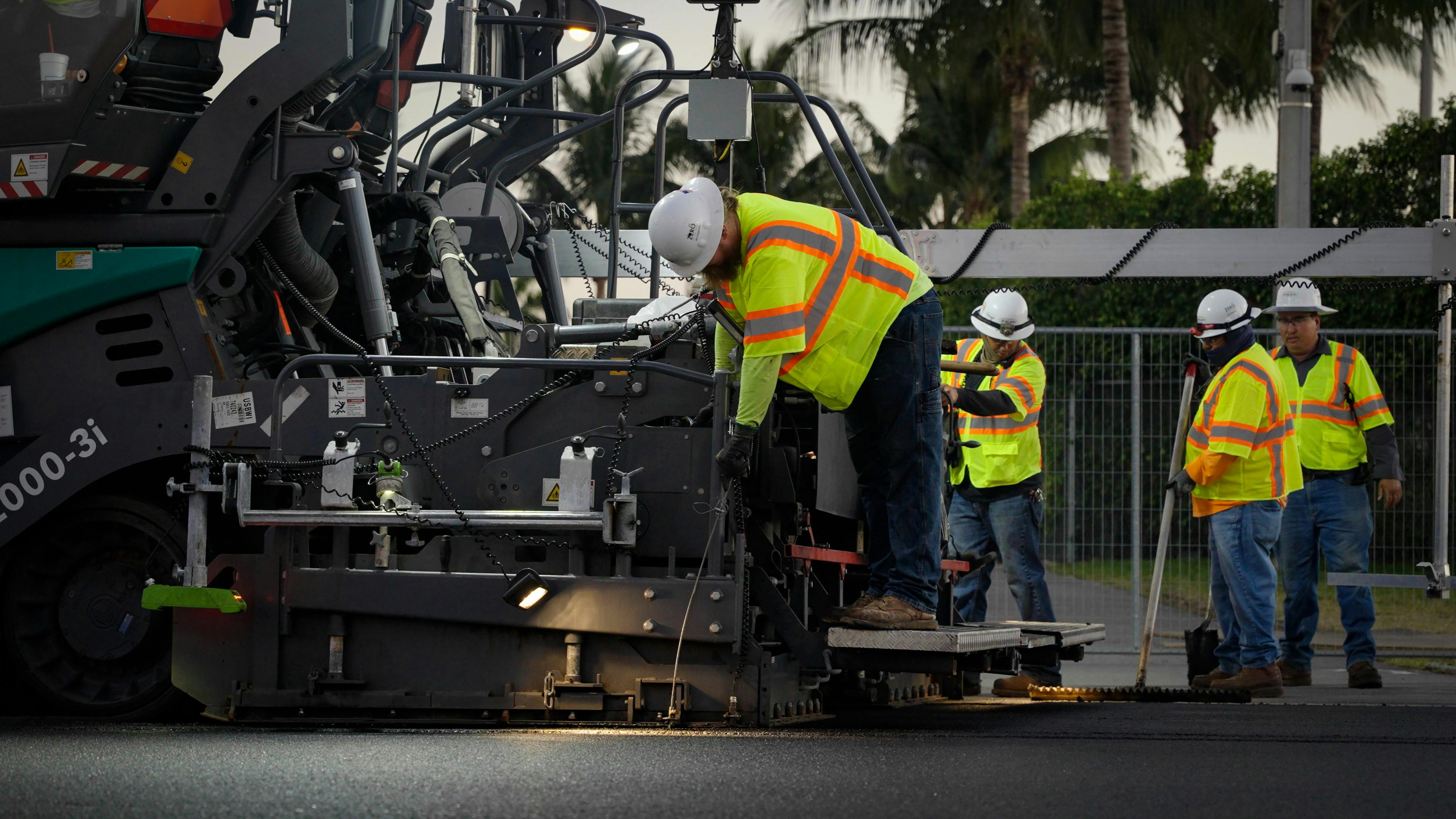 V&ouml;gele Products contractors paving a road