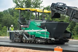 Vögele Products paving being fed asphalt Vögele Products paving being fed asphalt