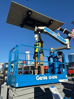 Genie’s zero gravity lifting assistant on a Genie GS scissor lift Genie’s zero gravity lifting assistant on a Genie GS scissor lift
