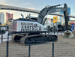 Deere excavator in booth Deere excavator in booth