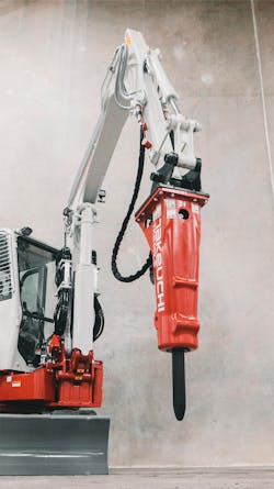 Takeuchi hammer attachment on a compact excavator. Takeuchi hammer attachment on a compact excavator.