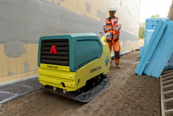 Ammann compaction plate next to a building Ammann compaction plate next to a building