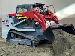 Takeuchi CTL dumping dirt Takeuchi CTL dumping dirt